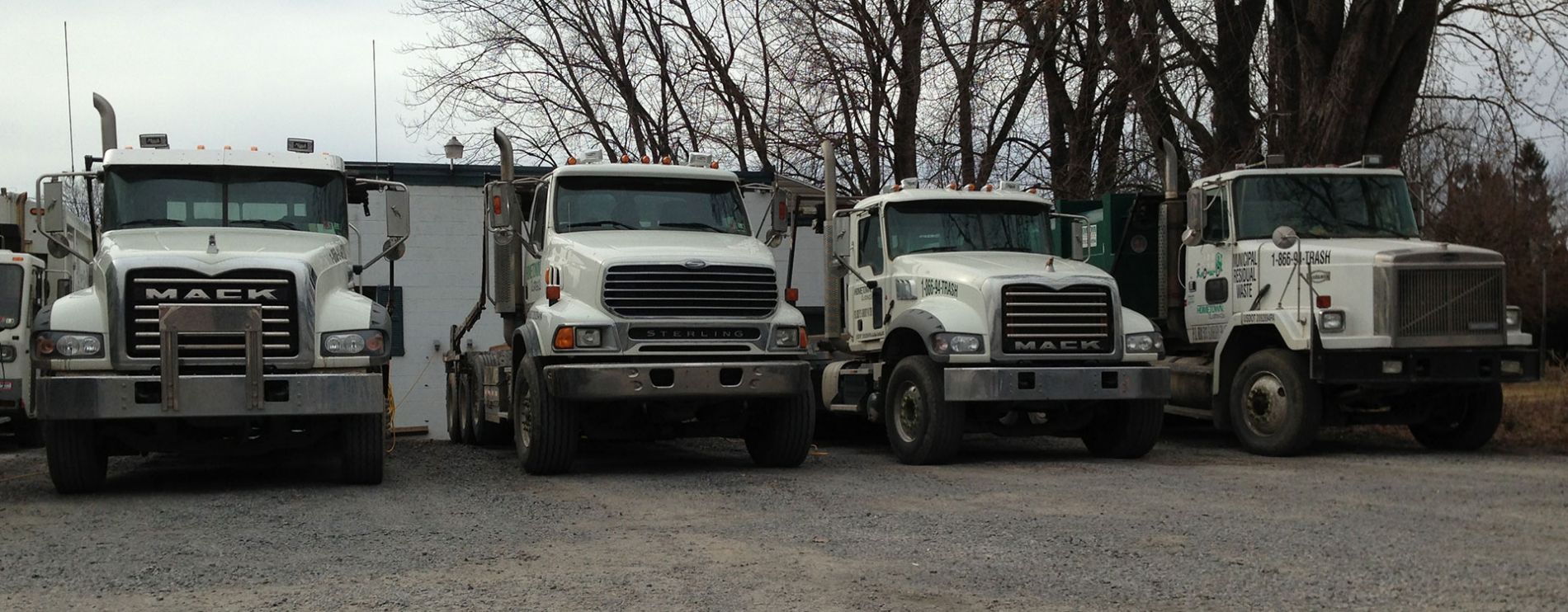 Parks Garbage Service Roll Off Trucks.